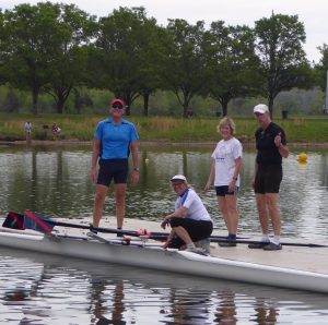 Spring break rowers in Oak Ridge on dock with oars